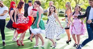 Group dancing in dresses for amazing coupon.